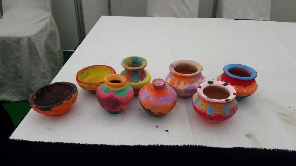 Little artists' painted pots